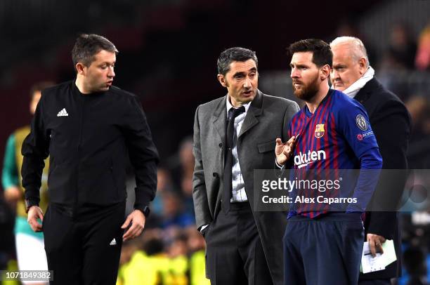 Substitute Lionel Messi of Barcelona stands alongside Ernesto Valverde, Manager of Barcelona during the UEFA Champions League Group B match between...