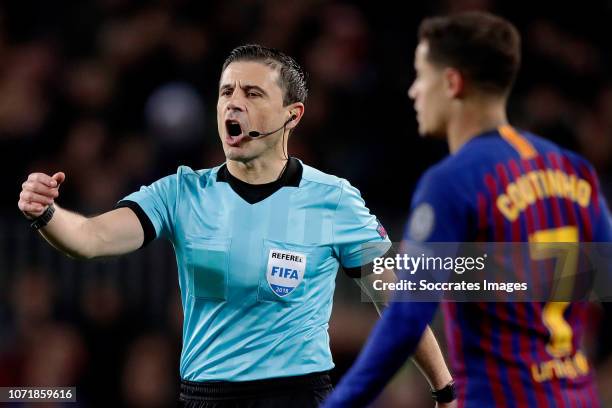 Referee Milorad Mazic during the UEFA Champions League match between FC Barcelona v Tottenham Hotspur at the Camp Nou on December 11, 2018 in...