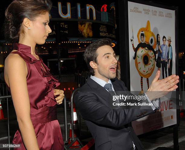 Actress Amanda Crew and actor Josh Zuckerman arrive at the Los Angeles premiere of "Sex Drive" on October 15, 2008 in Westwood, California.