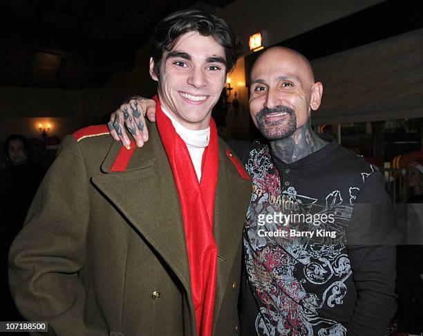 Actor RJ Mitte and actor Robert LaSardo attend Venice Magazine and Coca Cola's Parade Viewing Party at the Roosevelt Hotel on November 28, 2010 in...