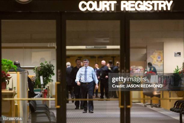 Scot Filer, CEO of Lions Gate Risk Management, enters the court registry following the bail hearing of Huawei Technologies Chief Financial Officer...