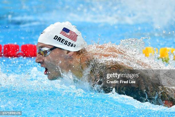 Caeleb Dressel of the United States competes Men's 100m Butterfly during 14th FINA World Swimming Championships - Day 2 on December 12, 2018 in...