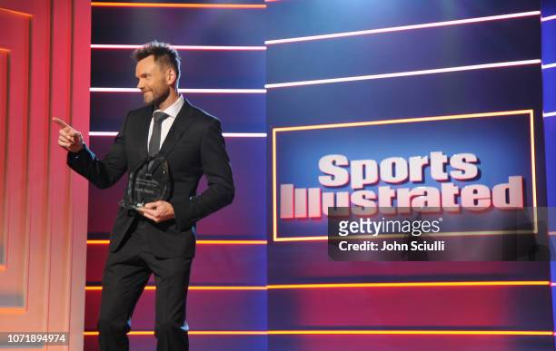 Joel McHale speaks onstage at Sports Illustrated 2018 Sportsperson of the Year Awards Show on Tuesday, December 11, 2018 at The Beverly Hilton in Los...