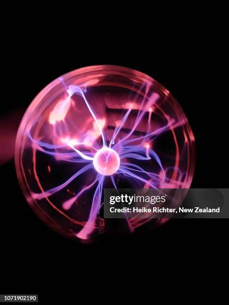 closeup of a plasma ball - plasma ball foto e immagini stock