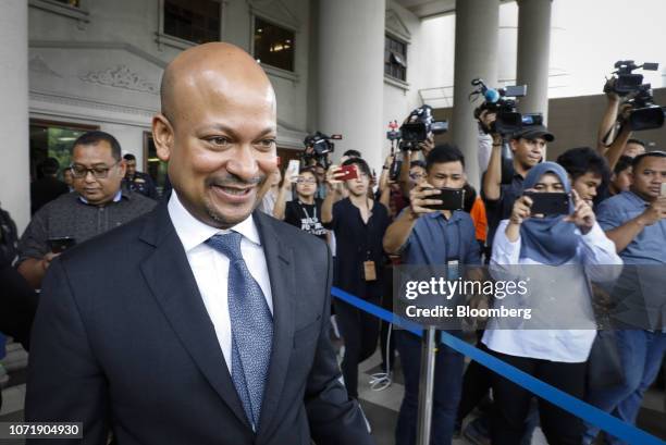 Arul Kanda, former president of 1Malaysia Development Bhd. , left, leaves the Kuala Lumpur Courts Complex in Kuala Lumpur, Malaysia, on Wednesday,...