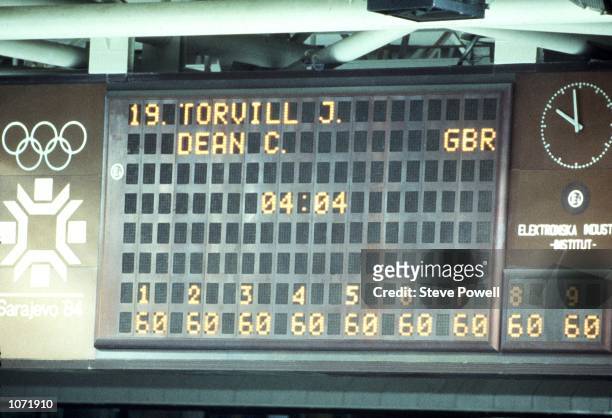 The scoreboard shows Jayne Torvill and Christopher Dean of Great Britain winning score and gold medal winning points during the Sarajevo Winter...