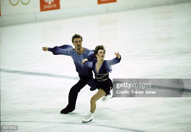 Jayne Torvill and Christopher Dean of Great Britain on their way to winning gold medals in the Ice Dancing event during the Sarajevo Winter Olympic...