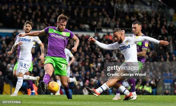 Kemar Roofe of Leeds United shoots at goal under pressure from Tomas Kalas of Bristol City during the Sky Bet Championship match between Leeds United...