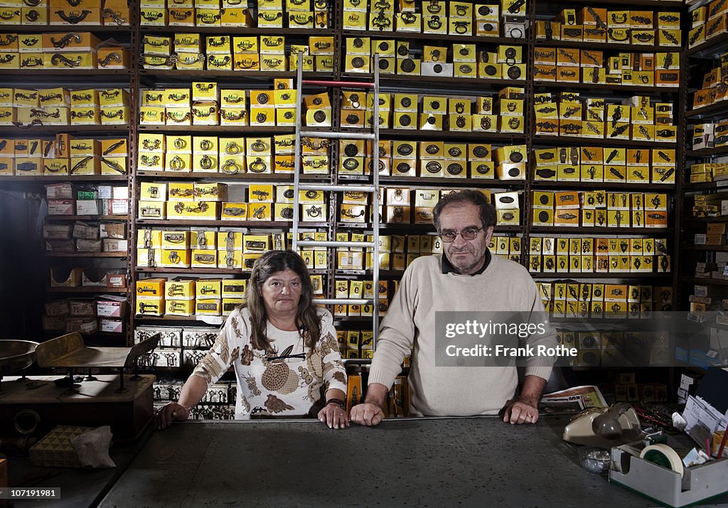 An old couple running there shop together 