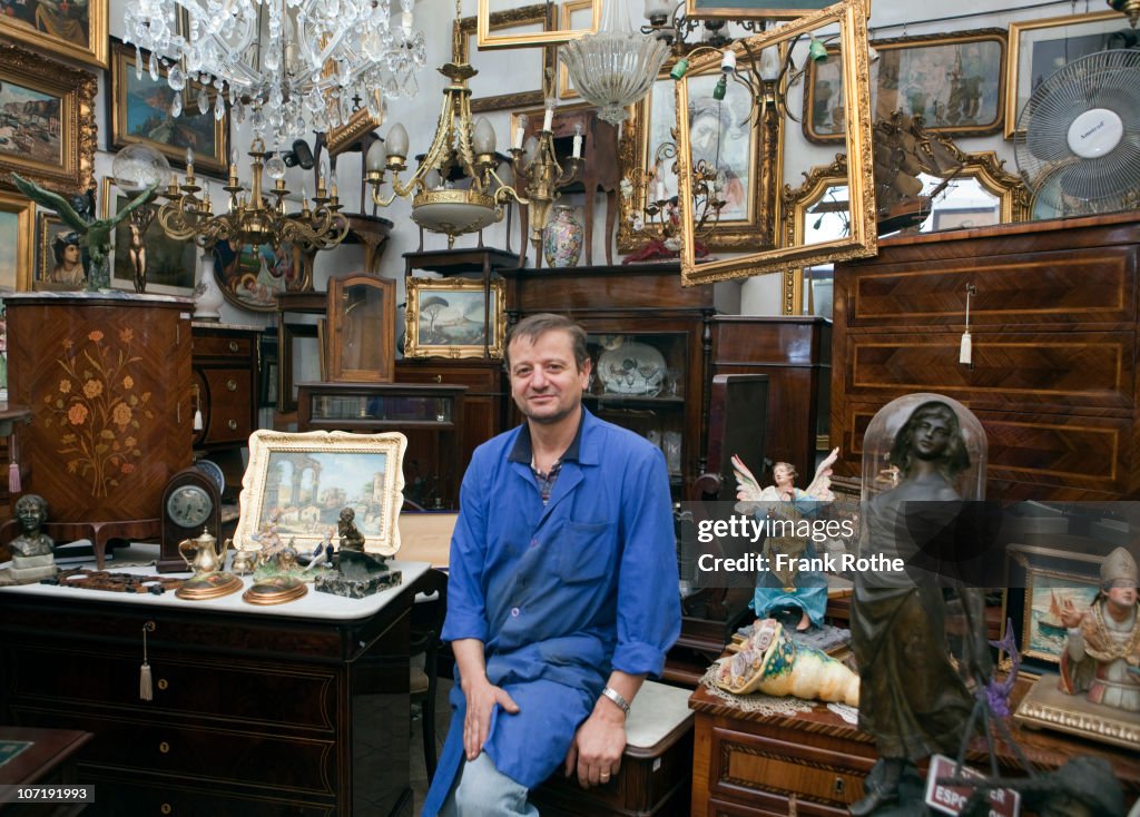 Shop owner in his antique shop
