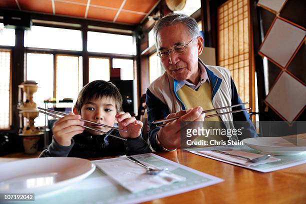 Grandfather teaching his grandson