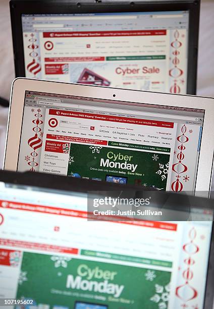 In this photo illustration, an ad seen on the Target website for a Cyber Monday sale is displayed on laptop computers on November 29, 2010 in San...