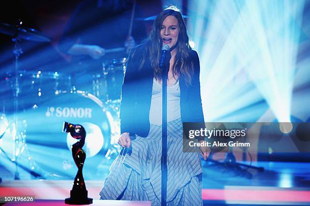 Judith Holofernes of 'Wir sind Helden' performs during the offical FIFA 2011 Women 's World Cup final draw on November 29, 2010 in Frankfurt am Main,...