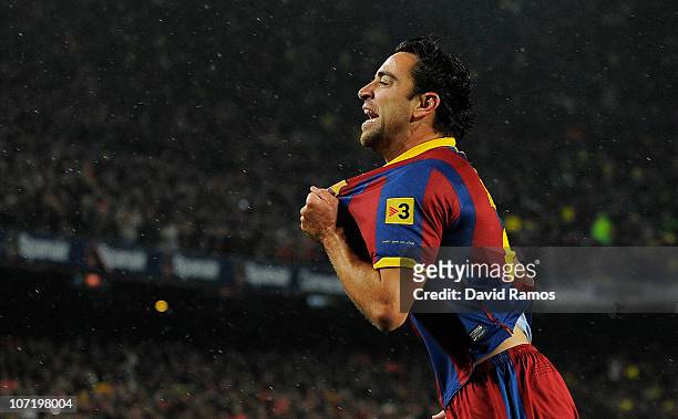Xavi Hernandez of Barcelna celebrates after scoring the first goal during the La Liga match between Barcelona and Real Madrid at the Camp Nou Stadium...