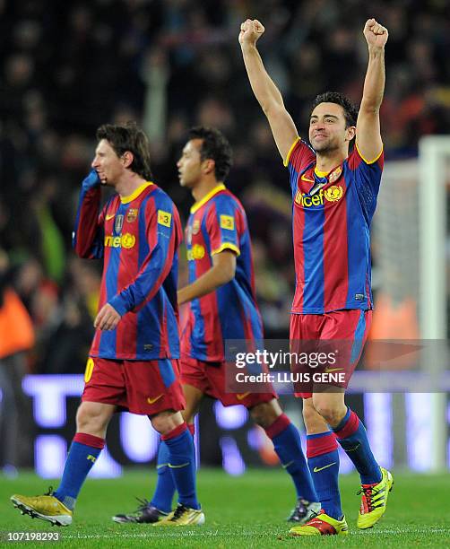 Barcelona's midfielder Xavi Hernandez celebrates at the end of the Spanish league "clasico" football match FC Barcelona vs Real Madrid on November...