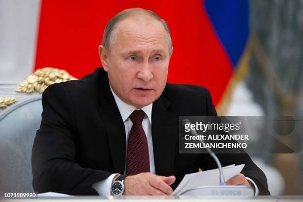 Russian President Vladimir Putin speaks a meeting to discuss preparation to mark the anniversary of the allied victory in the World War II in the...