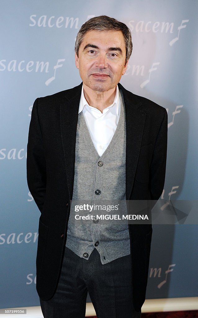 Sacem's member Richard Seff poses for photographers at the SACEM ...