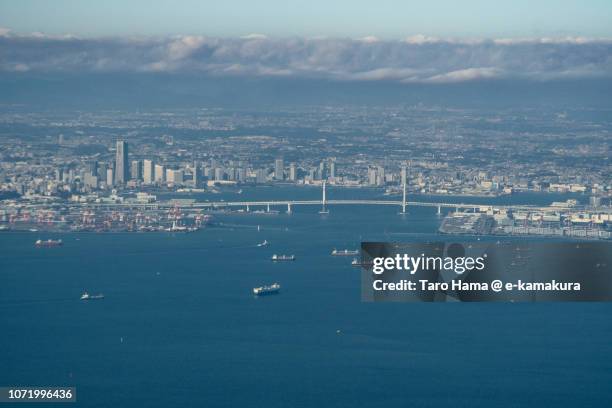 tokyo bay and yokohama city in kanagawa prefecture in japan daytime aerial view from airplane - bucht von tokio stock-fotos und bilder