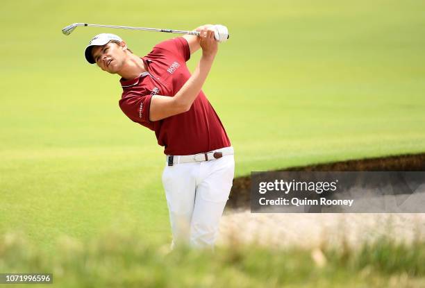 Thomas Detry of Belgium plays an approach shot during day four of the 2018 World Cup of Golf at The Metropolitan on November 25, 2018 in Melbourne,...