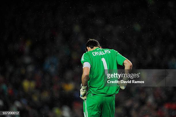 Iker Casillas of Real Madrid looks down after Pedro Rodriguez scored the second goal against Real Madrid during the La Liga match between Barcelona...