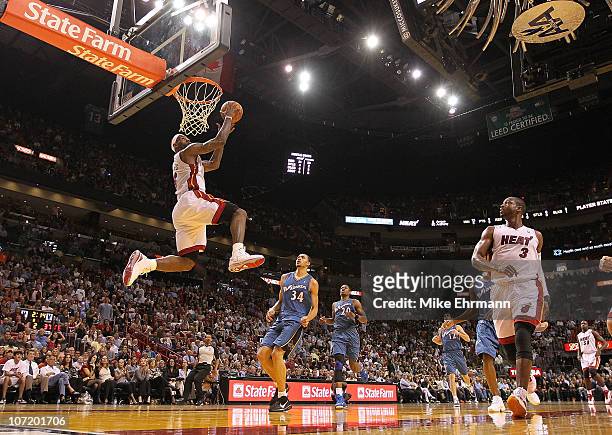 LeBron James of the Miami Heat dunks during a game against the Washington Wizards at American Airlines Arena on November 29, 2010 in Miami, Florida....