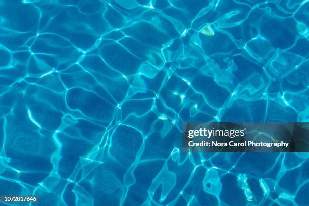 swimming pool surface abstract background - background ocean fotografías e imágenes de stock