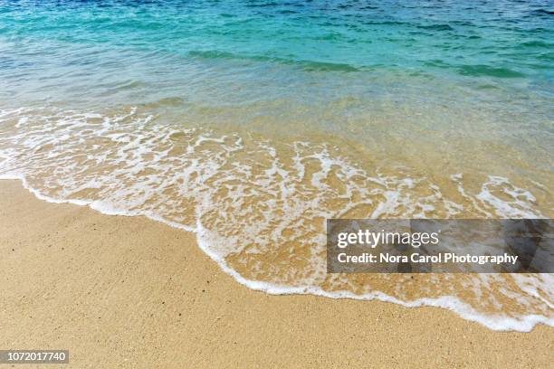 waves - kota kinabalu beach stock pictures, royalty-free photos & images