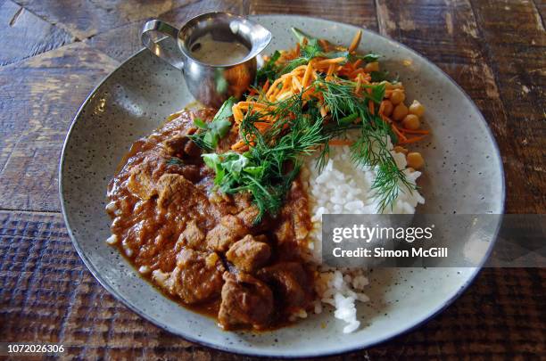 lamb curry with boiled rice, chickpeas, salad and raita - curry bildbanksfoton och bilder