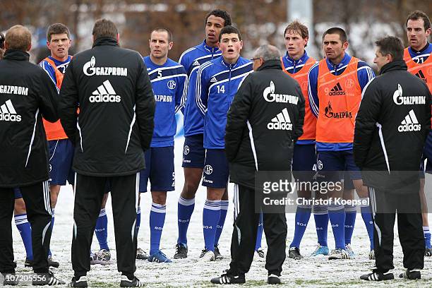 Head coach Felix Magath of Schalke speaks to the team during the FC Schalke training session at the training ground on November 30, 2010 in...