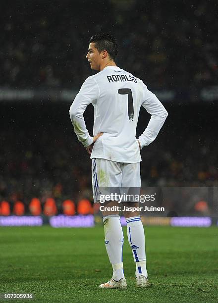 Cristiano Ronaldo of Real Madrid looks on during the la liga match between Barcelona and Real Madrid at the Camp Nou stadium on November 29, 2010 in...