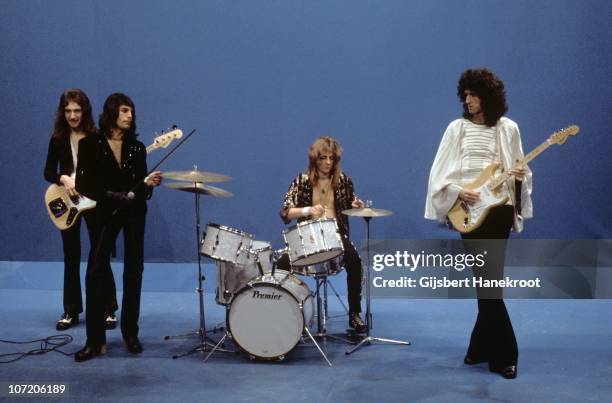 John Deacon, Freddie Mercury, Roger Taylor and Brian May of Queen perform 'Killer Queen' on Top Pop TV show on 22nd November 1974 in Hilversum,...