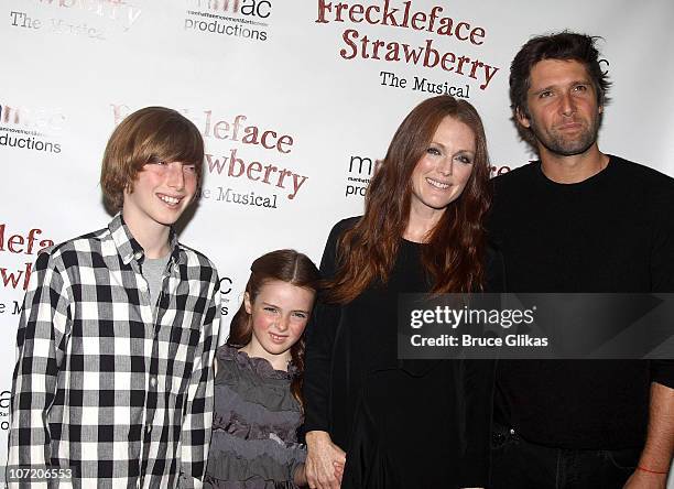 Caleb Freundlich, Liv Freundlich, mother Julianne Moore and husband Bart Freundlich attend the opening night of "Freckleface Strawberry The Musical"...