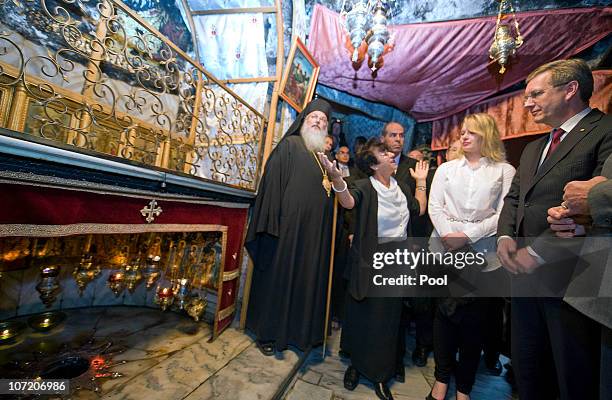 In this photo provided by the German Government Press Office, German President Christian Wulff and his daughter Annalena visit the Grotto of the...