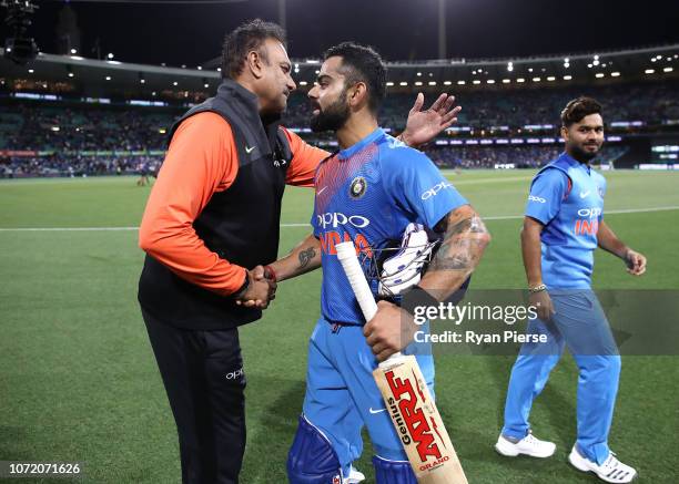 Virat Kohli of India is congratulated by Ravi Shastri, Head Coach of India, after the International Twenty20 match between Australia and India at...