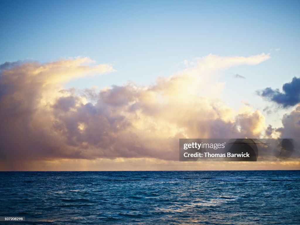 Sunrise and clouds over ocean