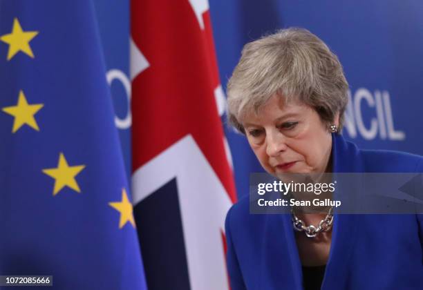 British Prime Minister Theresa May departs after speaking at a press conference after attending a special session of the European Council over Brexit...