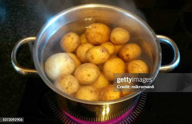 potatoes boiling in pan - boiling stock pictures, royalty-free photos & images