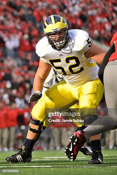 Stephen Schilling of the Michigan Wolverines blocks against the Ohio State Buckeyes at Ohio Stadium on November 27, 2010 in Columbus, Ohio.