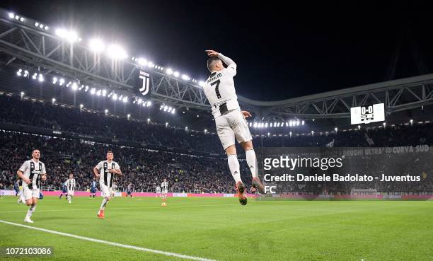 Cristiano Ronaldo of Juventus celebrates after scoring his sides first goal during the Serie A match between Juventus and SPAL at Allianz Stadium on...