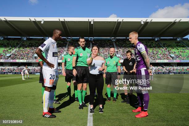 Kalifa Cisse of the Mariners and Andy Keogh of the Glory look on at the coin toss during the round five A-League match between the Perth Glory and...