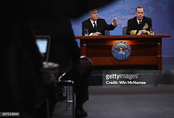 Secretary of Defense Robert M. Gates and Chairman, Joint Chiefs of Staff Adm. Mike Mullen answer questions during a briefing at the Pentagon on the...