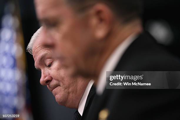 Secretary of Defense Robert M. Gates and Chairman, Joint Chiefs of Staff Adm. Mike Mullen answer questions during a briefing at the Pentagon on the...