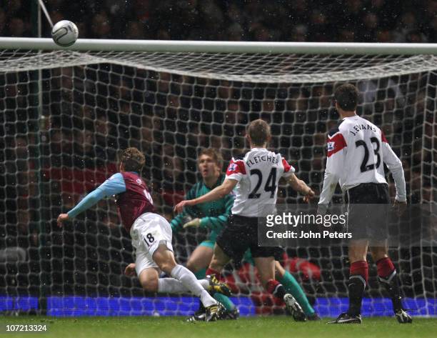 Jonathan Spector of West Ham United scores their first goal during the Carling Cup quarter-final match between West Ham United and Manchester United...