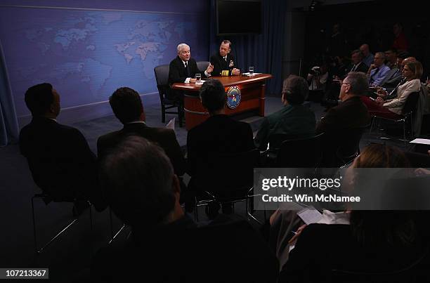 Secretary of Defense Robert M. Gates and Chairman, Joint Chiefs of Staff Adm. Mike Mullen answer questions during a briefing at the Pentagon on the...