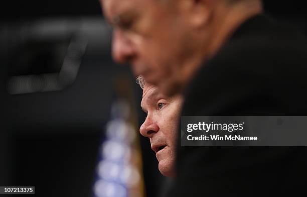 Secretary of Defense Robert M. Gates and Chairman, Joint Chiefs of Staff Adm. Mike Mullen answer questions during a briefing at the Pentagon on the...