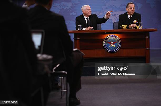 Secretary of Defense Robert M. Gates and Chairman, Joint Chiefs of Staff Adm. Mike Mullen answer questions during a briefing at the Pentagon on the...