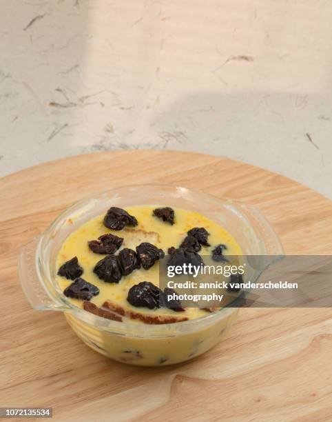 fruity liqueur bread pudding preparation - fruity bread stock pictures, royalty-free photos & images