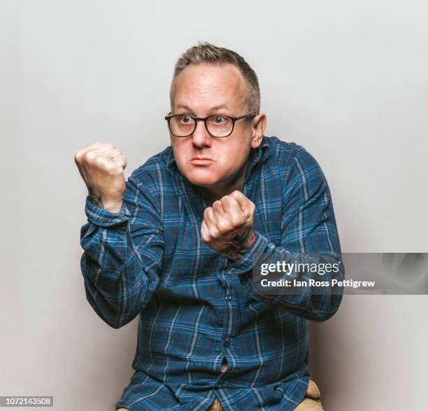 middle-aged man hands up ready to fight - fighting stance stock pictures, royalty-free photos & images
