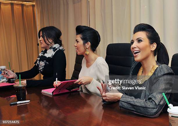 Khloe Kardashian, Kourtney Kardashian and Kim Kardashian promote their new book "Kardashian Konfidential" at Barnes & Noble, 5th Avenue on November...