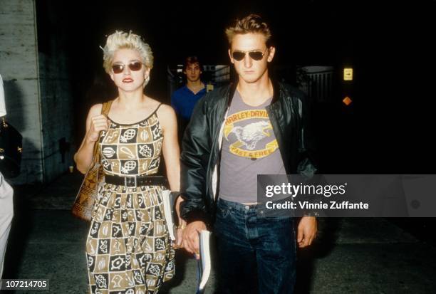 Acting couple Madonna and Sean Penn leave rehearsals for their play 'Goose and Tom Tom' in August 1986 in New York City, New York.